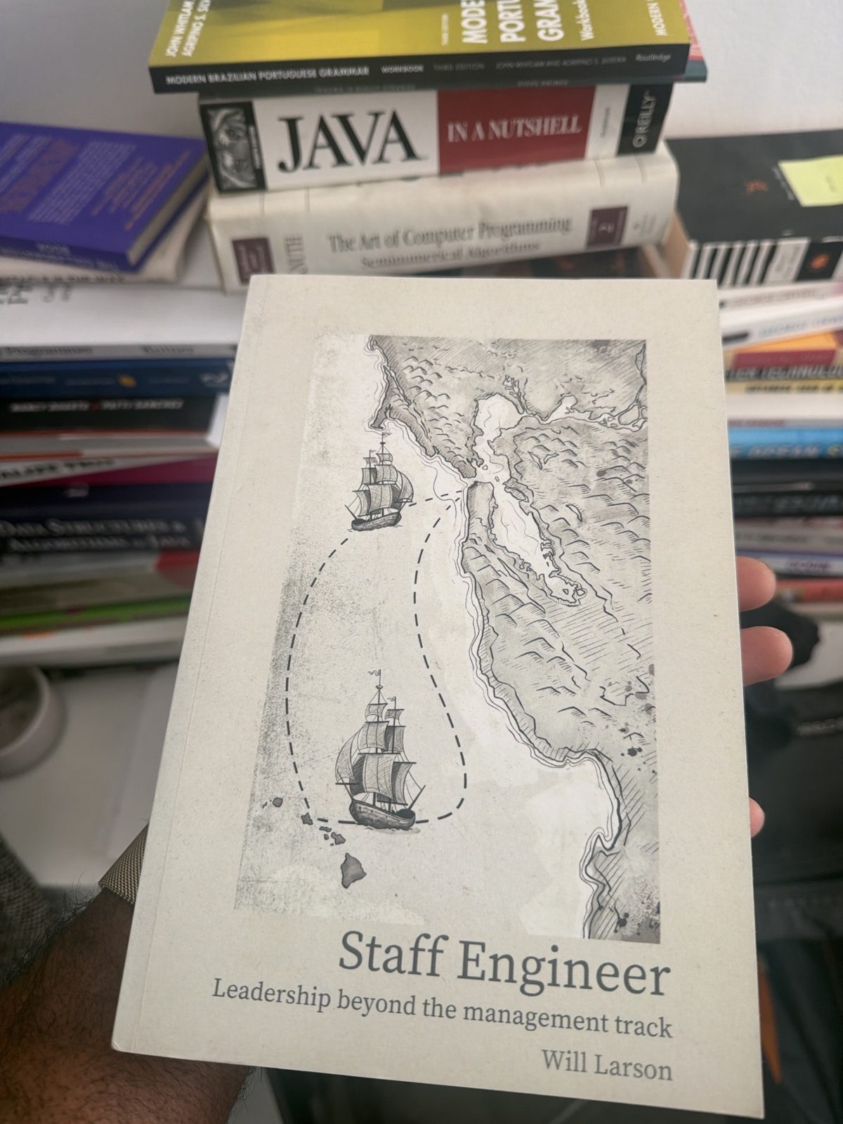 My copy of Will Larson's Staff Engineer, taken off the shelf for this piece.